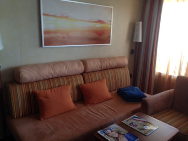 Sitting area in a cabin for the Carnival Breeze