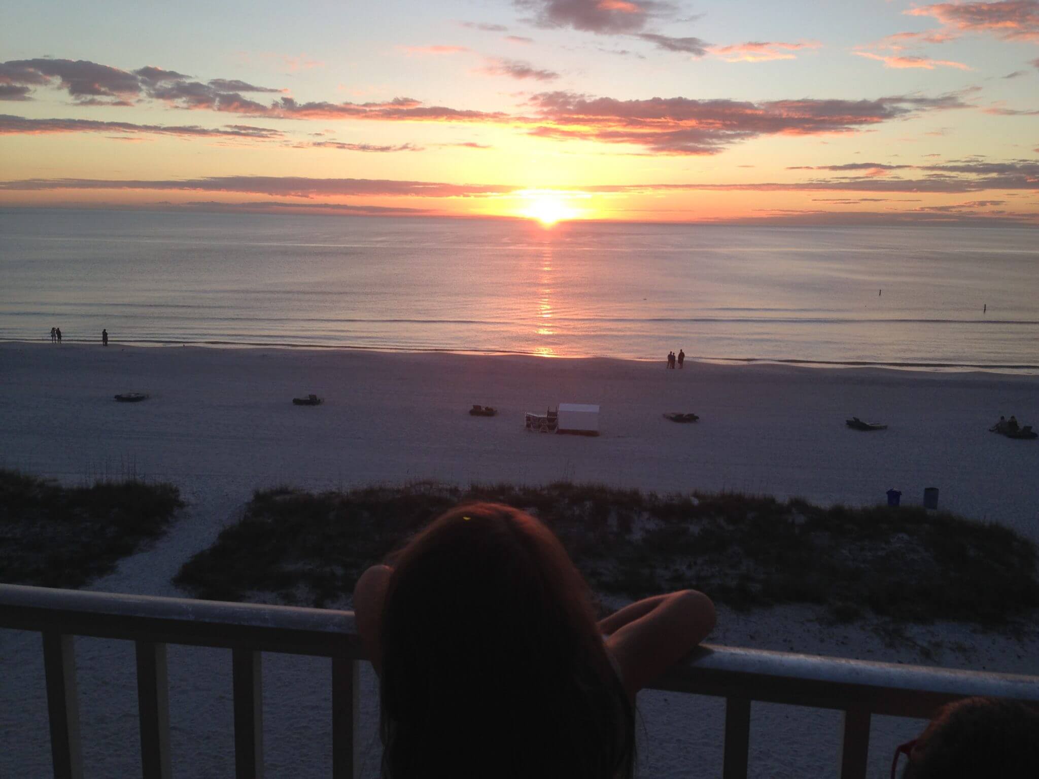 Watching the Sunset from our a hotel balcony in Treasure Island, Florida.