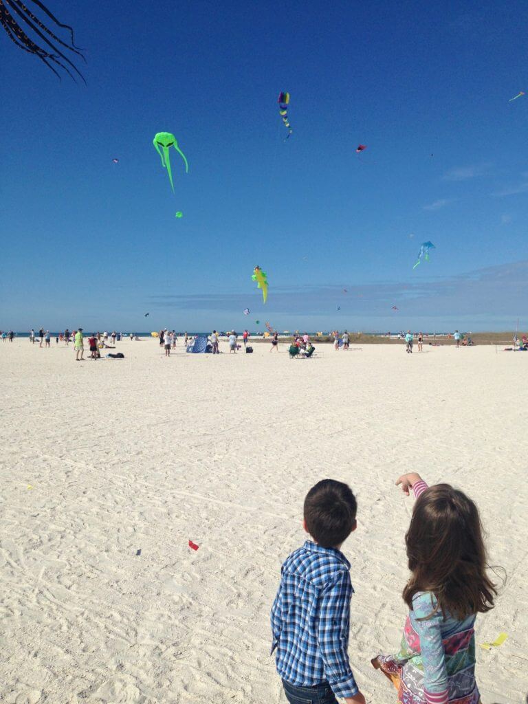 Kids looking at the Kits at the Treasure Island Kite Festival in Treasure Island, Florida.