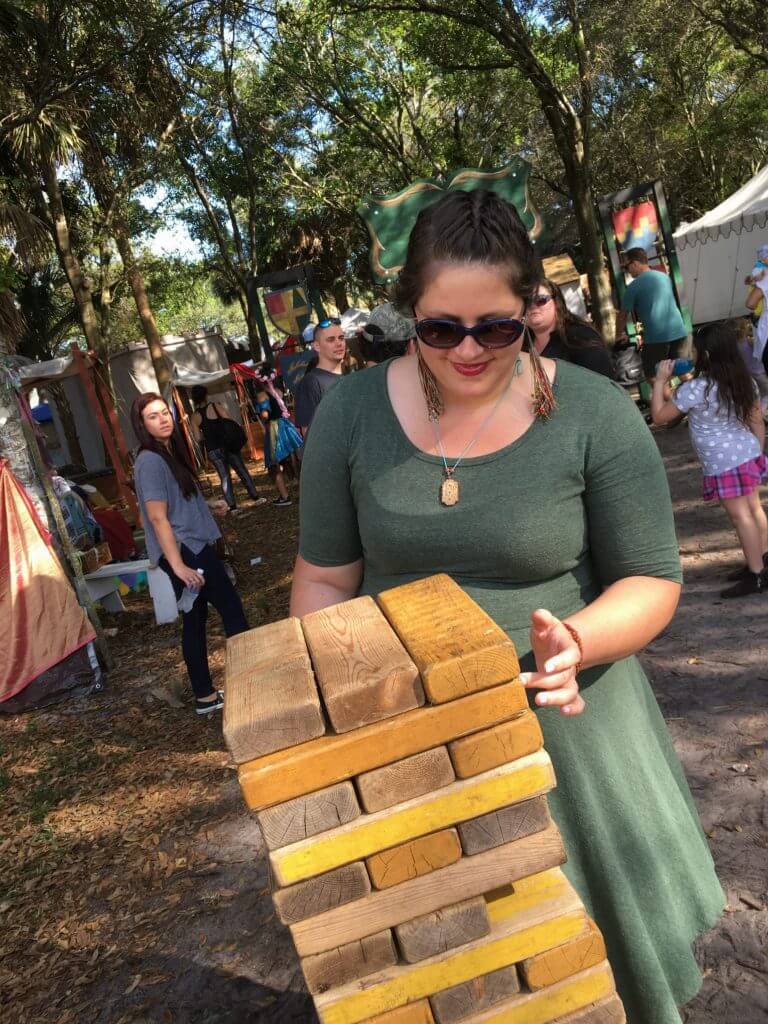 Playing Jenga at the Florida Renaissance Festival 