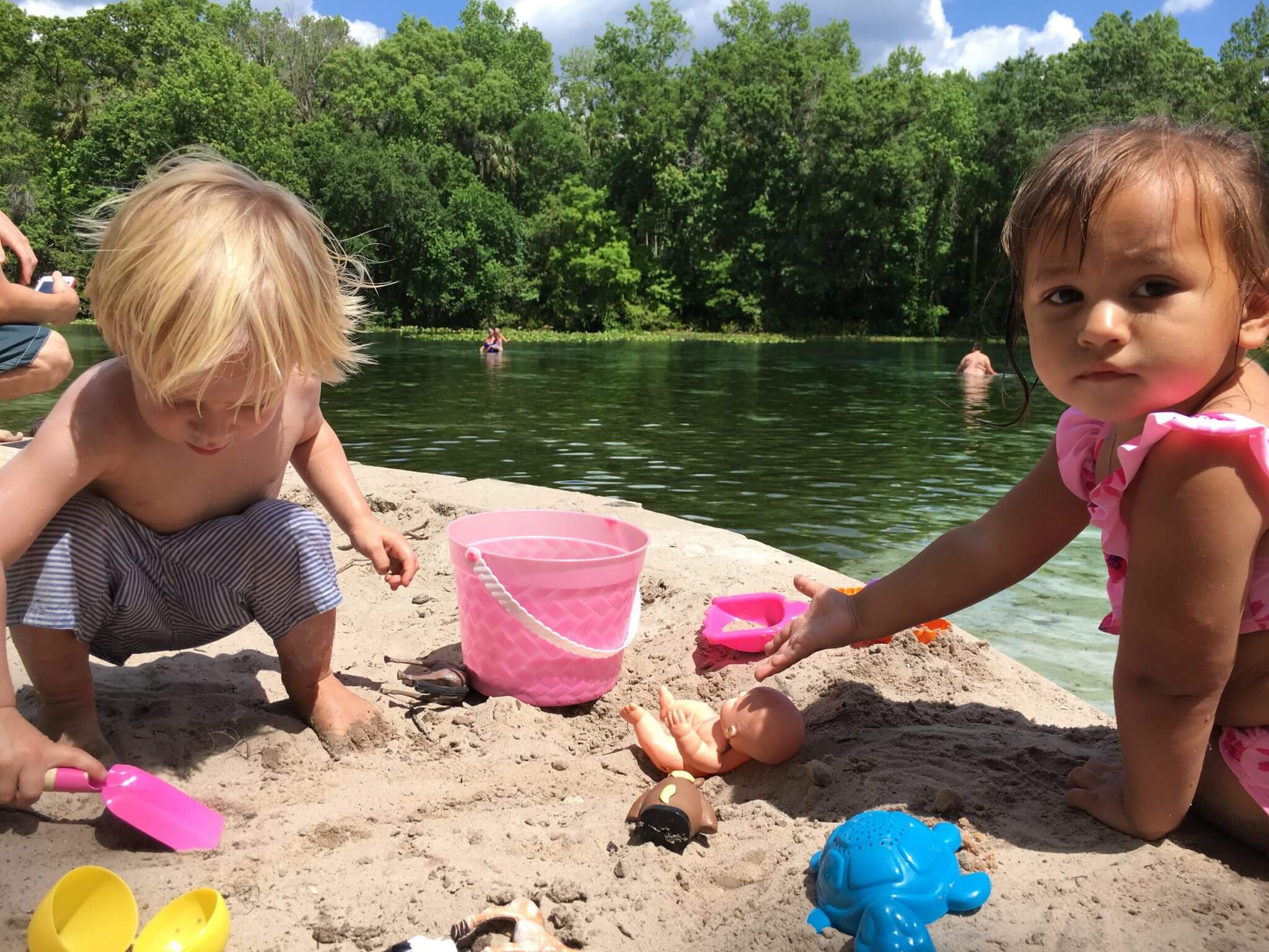 Playing in the sand at Alexander Springs in Ocala National Forest in Norther Florida. Tips for Tent Camping with a Toddler and more Family Travel Tips at www.HuntingforRubies.com
